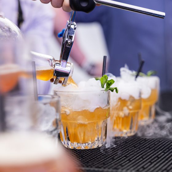 Two drinks bubbling over from The Alchemist